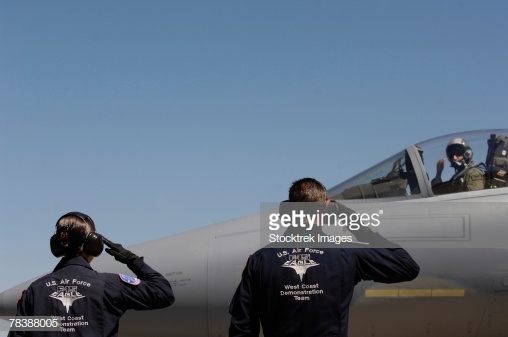 air-force-airmen-salute-the-captain-of-an-f15-eagle-picture-id78388005
