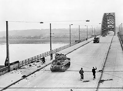 British_XXX_Corps_cross_the_road_bridge_at_Nijmegen_.jpg