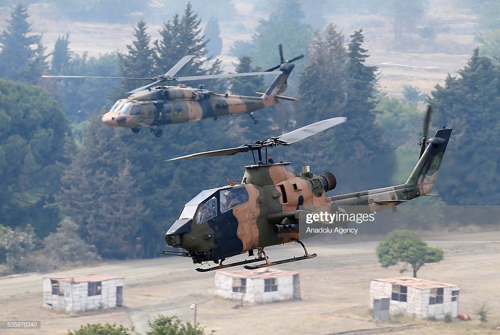 combat-helicopters-are-in-action-during-the-efes2016-combined-joint-picture-id535976340