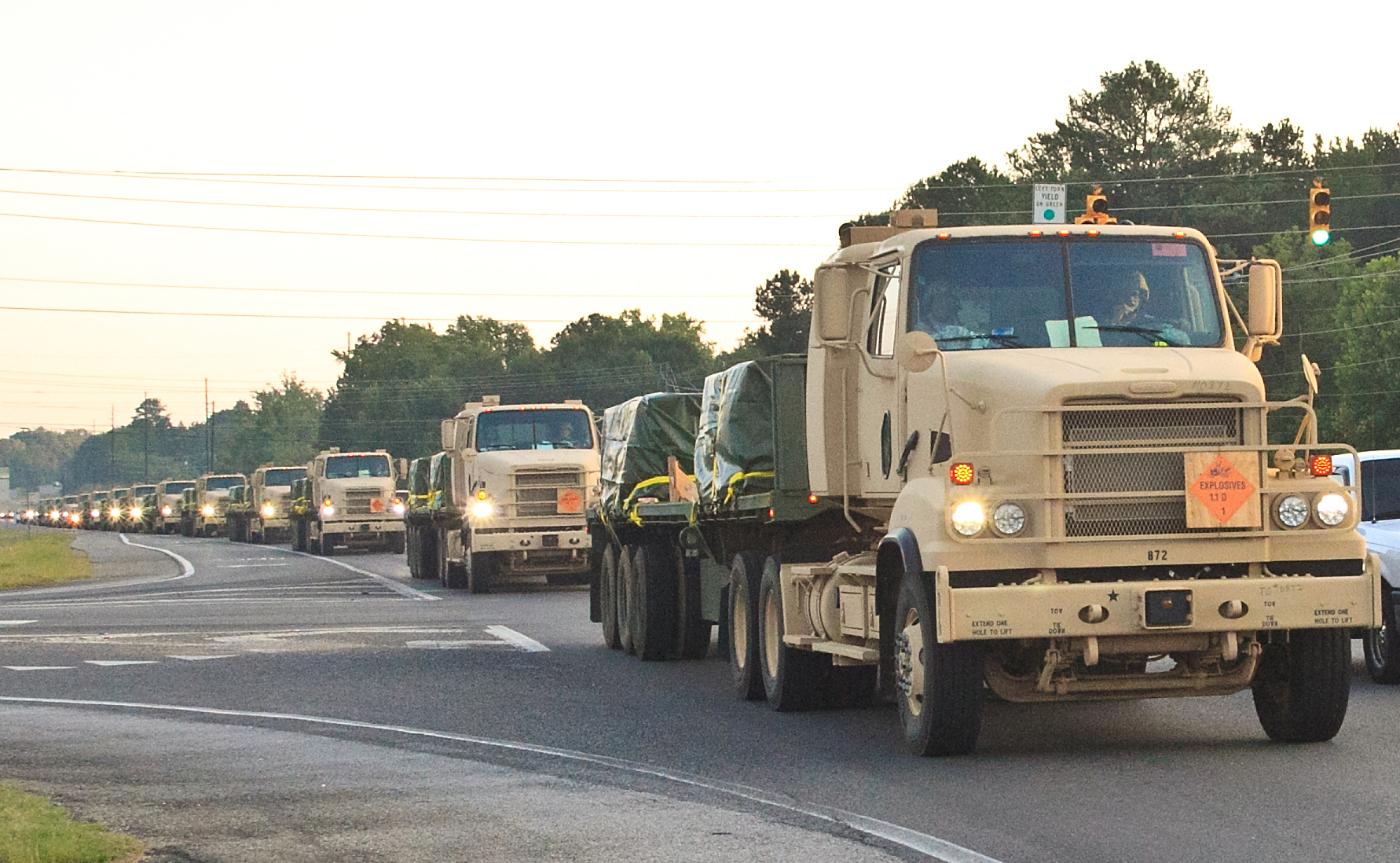 Military_trucks_laden_with_ammunition_convoy.jpg