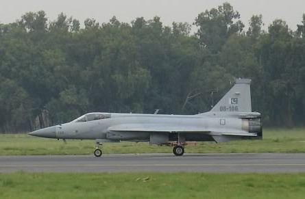 Side_view_of_JF-17_taxiing_with_trucks_in_background_cropped_version.jpg