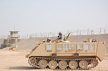 220px-USAF_M113_APC_at_Camp_Bucca%2C_Iraq.jpg