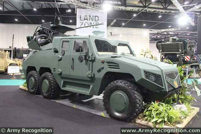 NIMR_Tawazun_6x6_wheeled_multi-role_combat_vehicle_UAE_at_DSEI_2013_defense_exhibition_London_United_Kingdom_001.jpg