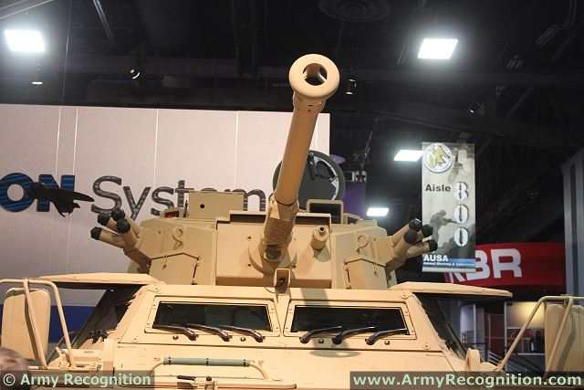 Commando_90mm_Direct_Fire_4x4_armoured_vehicle_Textron_Marine_Land_Systems_AUSA_2013_002.jpg