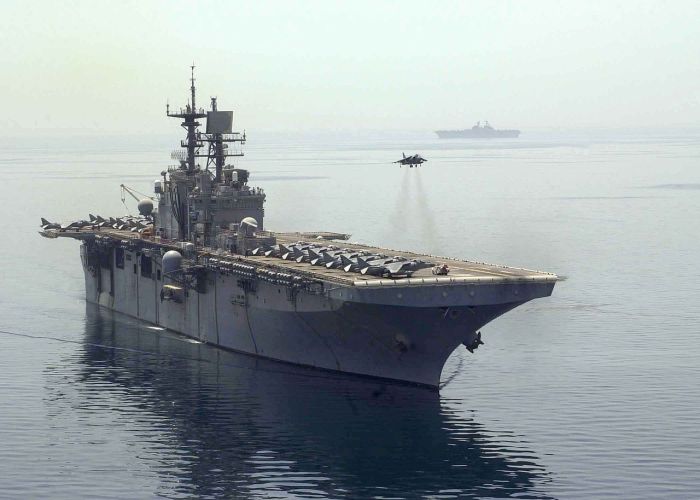 us_navy_030425-n-4008c-508_an_av-8b_harrier_aircraft_hovers_above_the_flight_deck_of_the_amphibious_assault_ship_uss_bataan_lhd_5.jpg