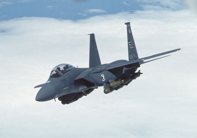boeing-f-15e-strike-eagle-flying-enroute-above-a-layer-of-news-photo-1614802868.