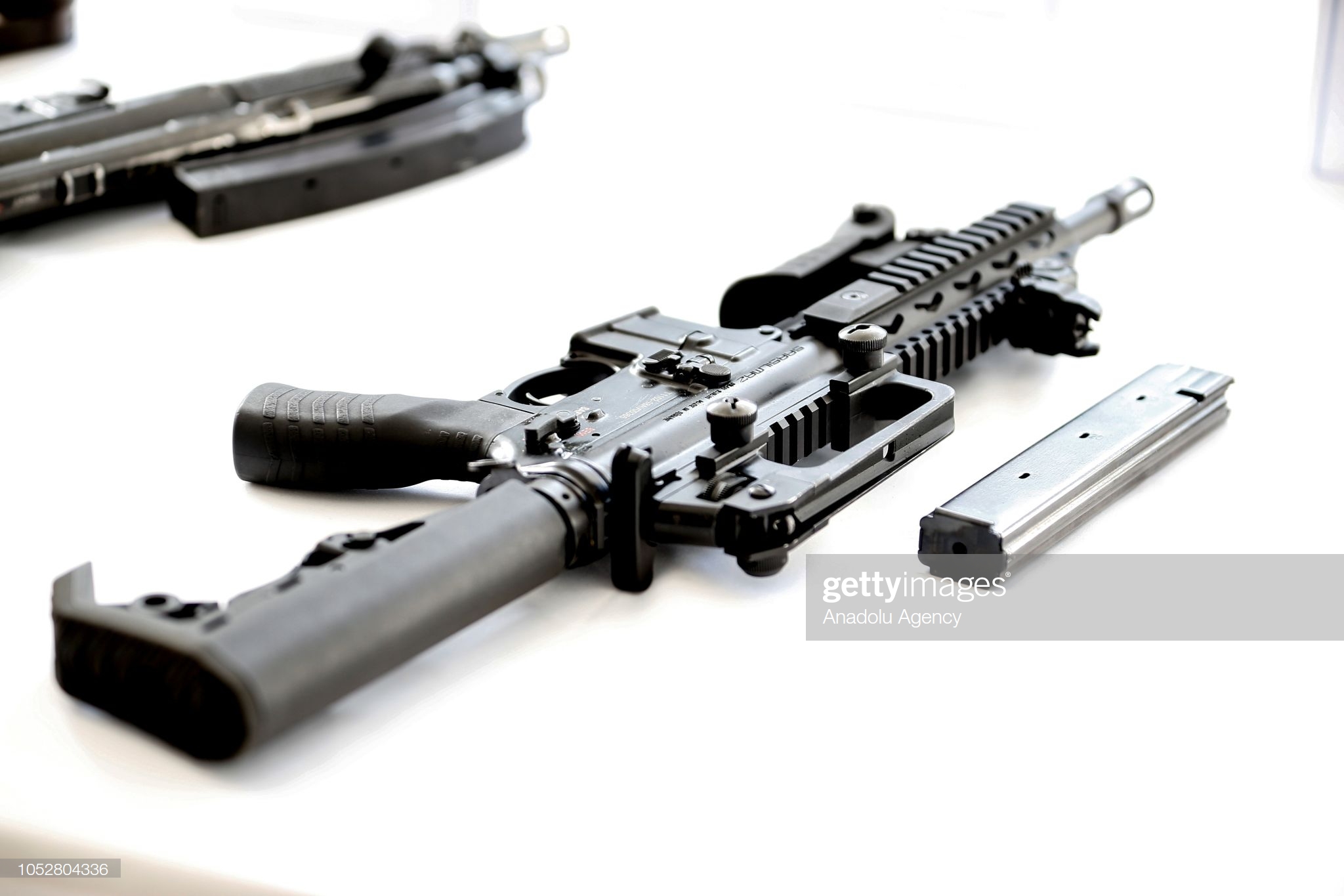 submachine-gun-is-displayed-during-the-international-association-of-picture-id1052804336