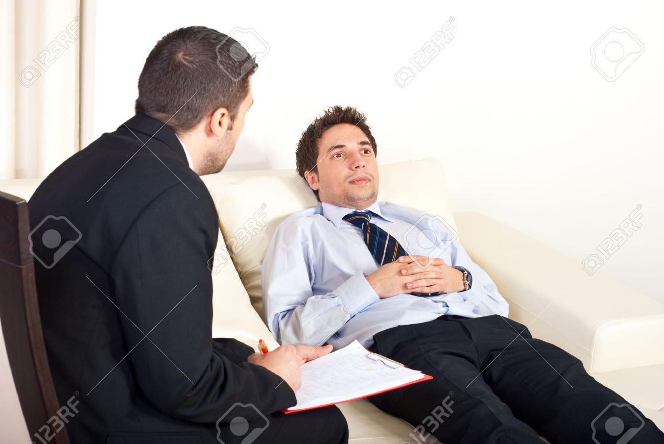 8902689-psychiatrist-man-talking-with-hypnotized-male-patient.jpg