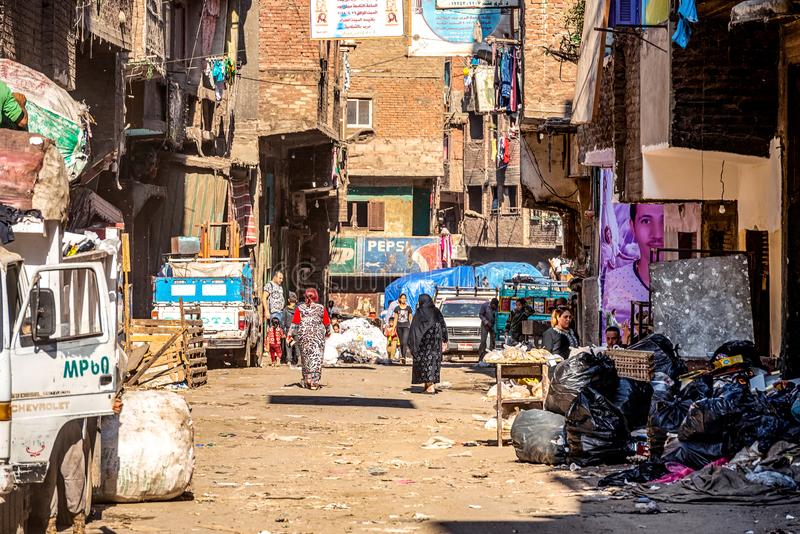 cairo-egypt-inhabitants-garbage-city-streets-his-area-bunch-ineligible-stink-138727649.jpg
