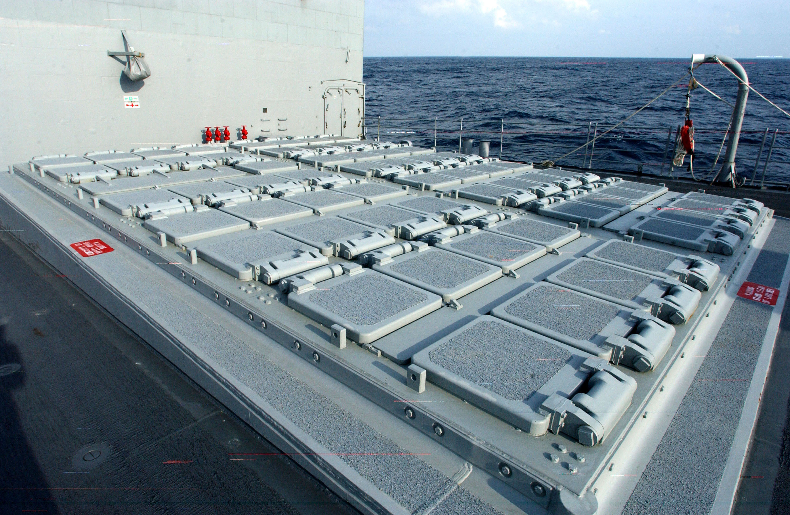 US_Navy_030303-N-3235P-503_A_topside_view_of_the_forward_MK-41_Vertical_Launching_System_(VLS)_aboard_the_guided_missile_cruiser_USS_San_Jacinto_(CG_56).jpg