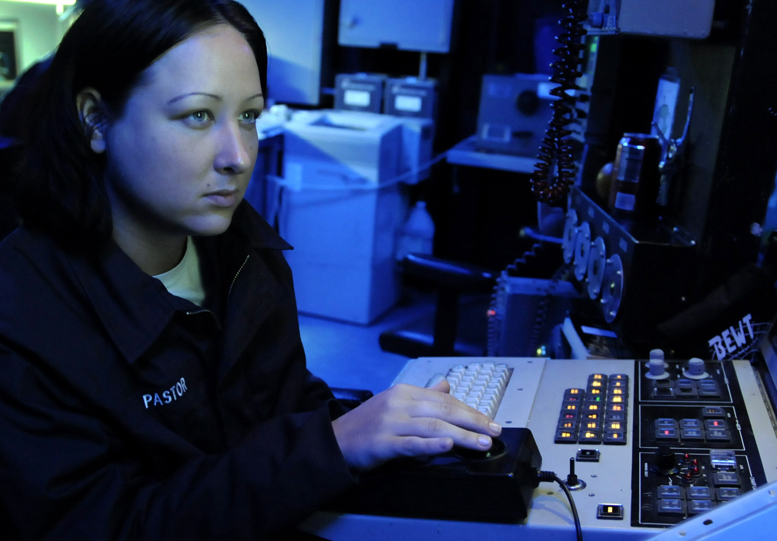 US_Navy_091019-N-7478G-090_Cryptologic_Technician_(Technical)_Seaman_Jennifer_Pastor_stands_watch_at_the_Surface_Electronics_Emission_Console_(SLQ-32)_in_the_combat_information_center_aboard_the_amphibious_command_ship_USS_Blue.jpg