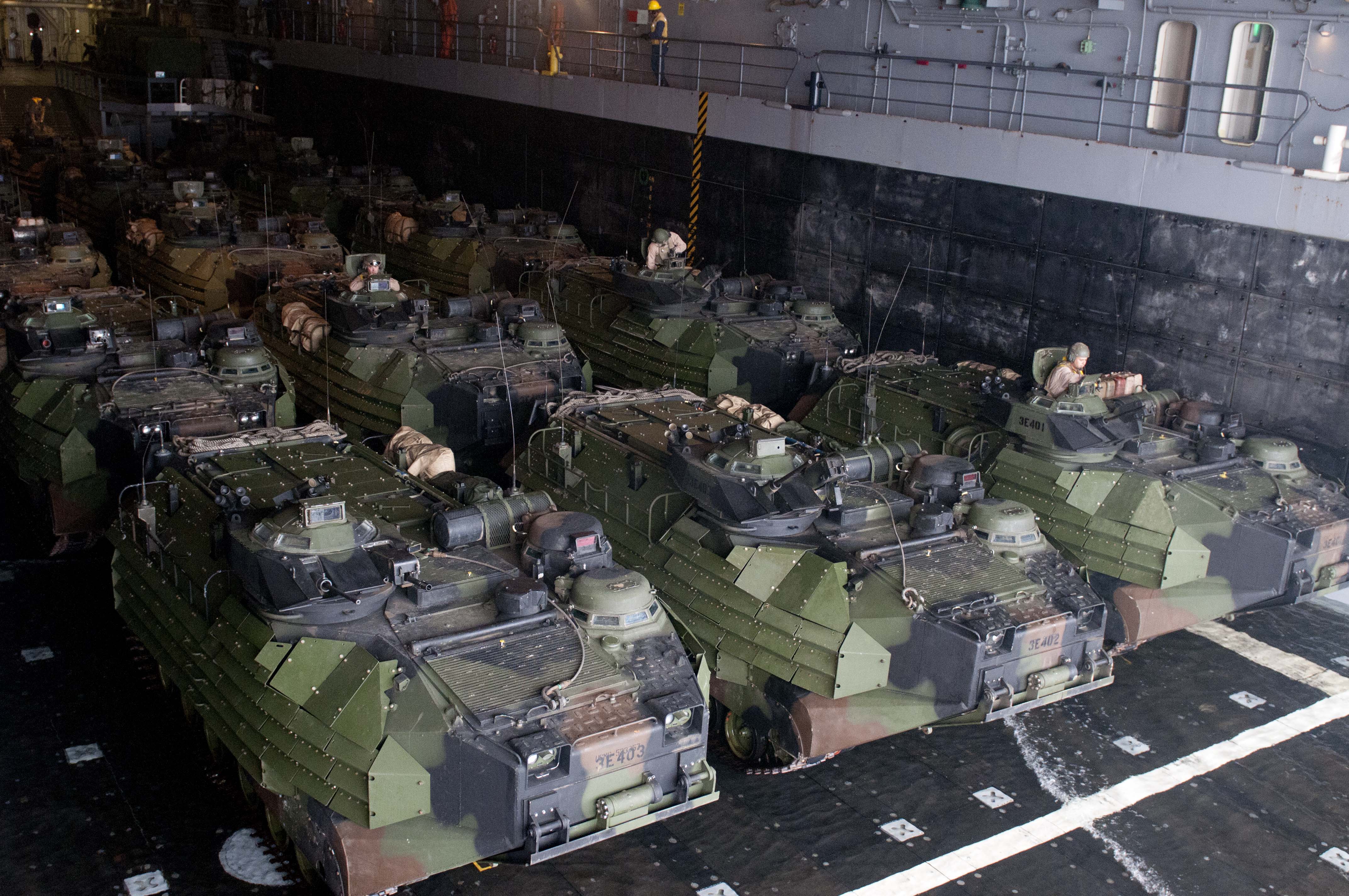 US_Navy_110815-N-PB383-001_Amphibious_assault_vehicles_prepare_to_depart_the_well_deck_of_the_San_Antonio-class_amphibious_transport_dock_ship_USS.jpg
