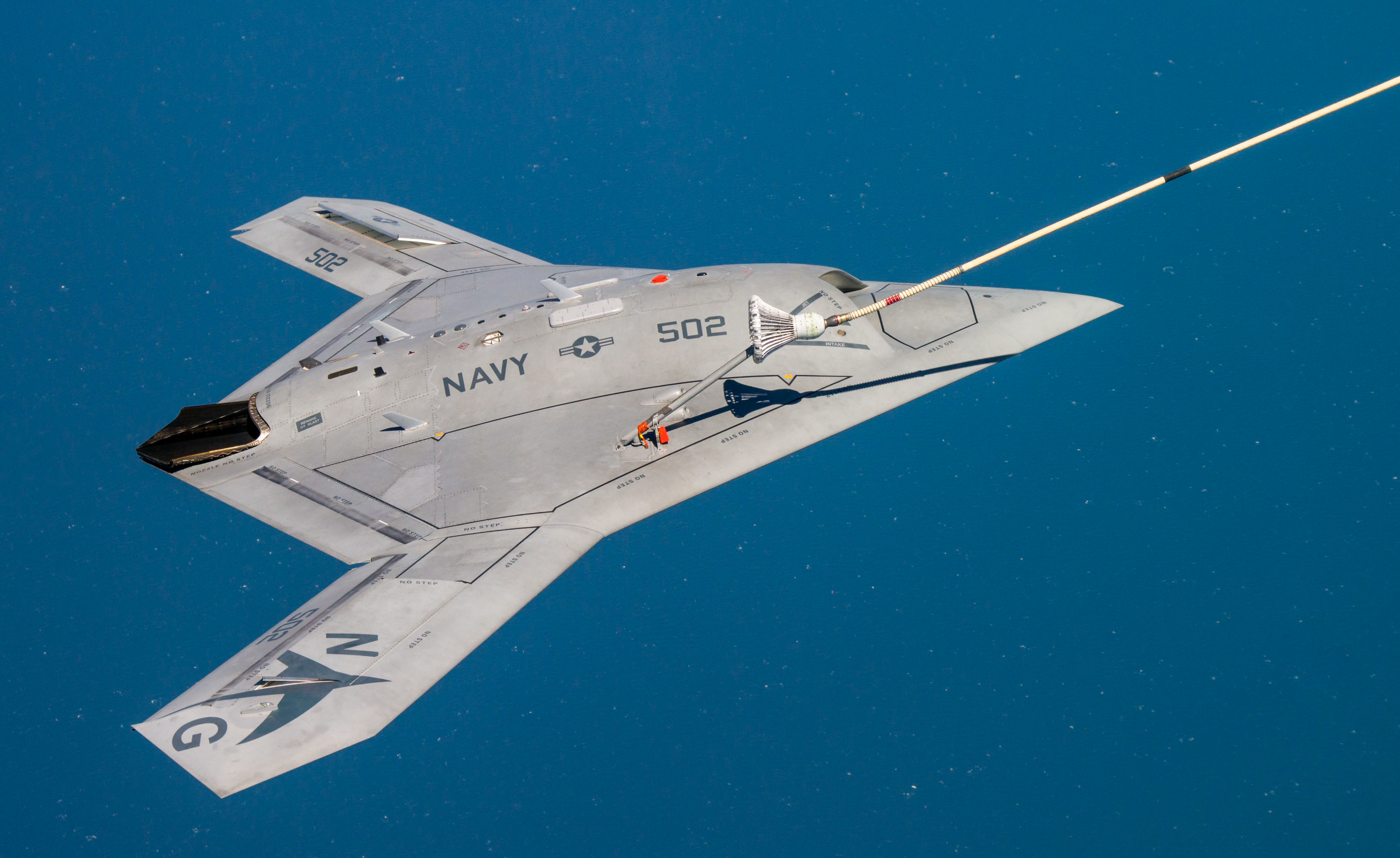 X-47B_receiving_fuel_from_a_707_tanker_while_operating_in_the_Atlantic_Test_Ranges.jpg
