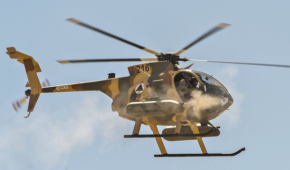 1200px-Afghan_Air_Force_MD-530F_helicopter_fires_machine_guns.jpg