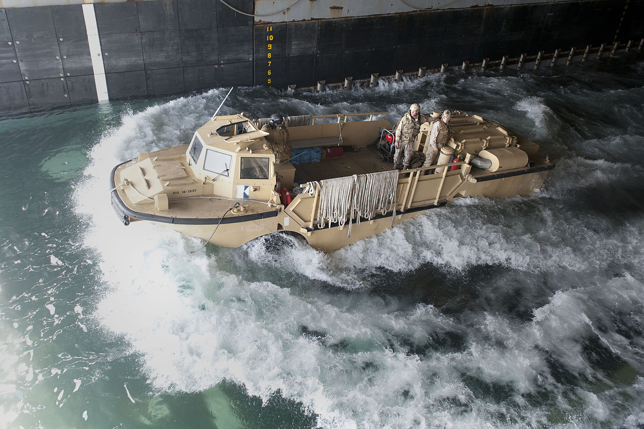 1280px-US_Navy_120127-N-KS651-215_A_lighter_amphibious_re-supply_cargo_departs_the_welldeck_of_amphibious_dock_landing_ship_USS_Pearl_Harbor_%28LSD_52%29_duri.jpg