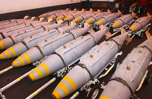 512px-US_Navy_030323-N-1328C-507_GBU-31_Joint_Direct_Attack_Munitions_(JDAM)_are_staged_in_the_hanger_bay.jpg