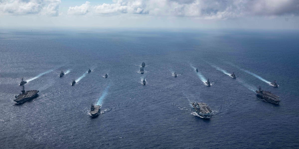  البحرية الصينية تتدرب على الهبوط على ساحل تايوان وبايدن يحذر الصين