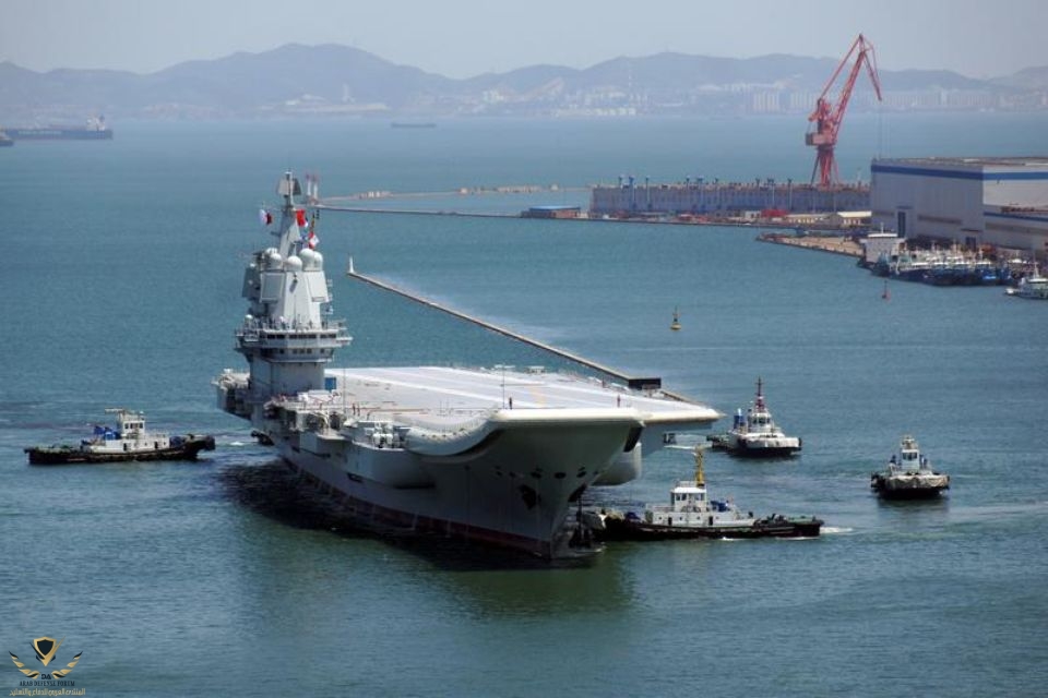 1125178-china-s-first-domestically-developed-aircraft-carrier-is-seen-at-a-port-in-dalian-afte...jpg