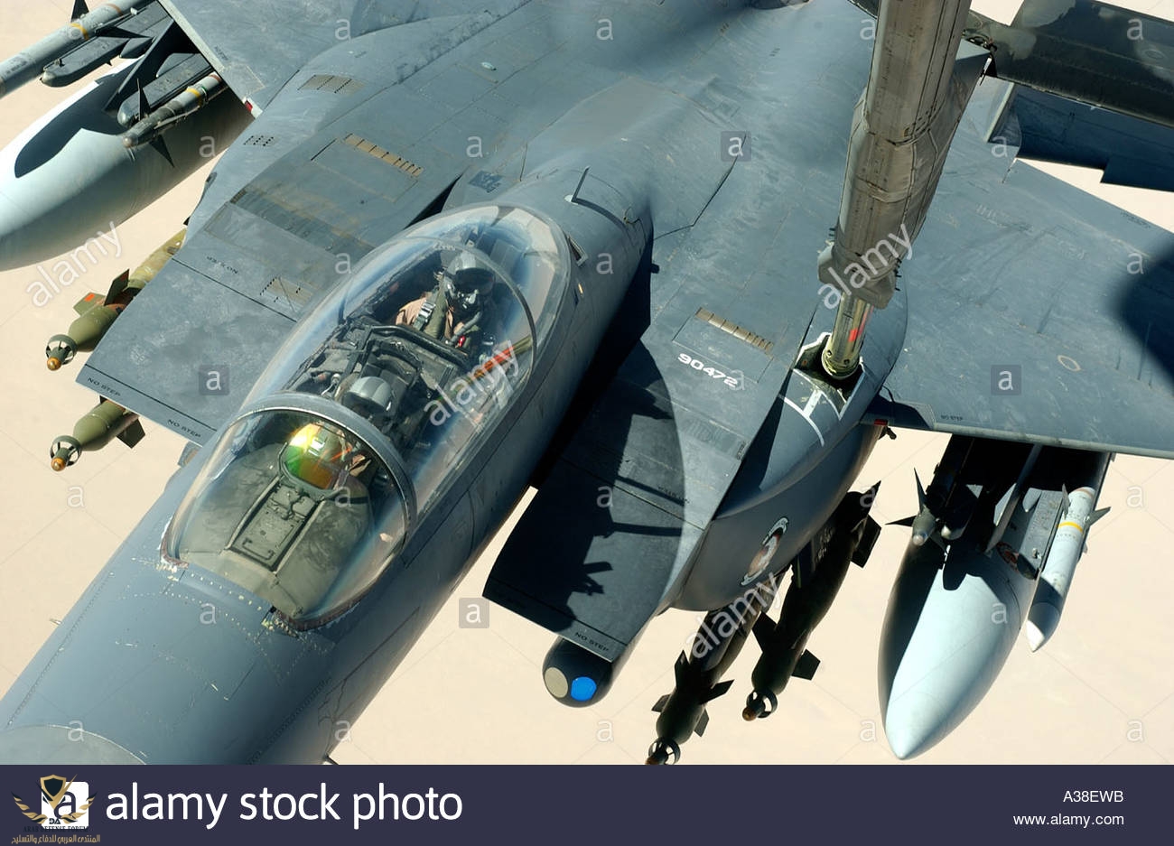 over-iraq-an-f-15-strike-eagle-recieves-fuel-from-a-kc-10-during-a-A38EWB.jpg