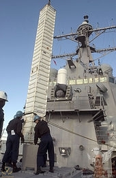 170px-US_Navy_050110-N-9851B-056_Sailors_aboard_the_guided_missile_destroyer_USS_Curtis_Wilbur...jpg