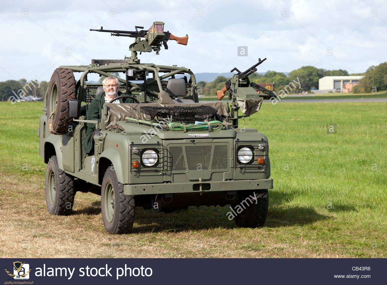 land-rover-defender-in-the-military-parade-at-dunsfold-wings-and-wheels-CB43R6.jpg