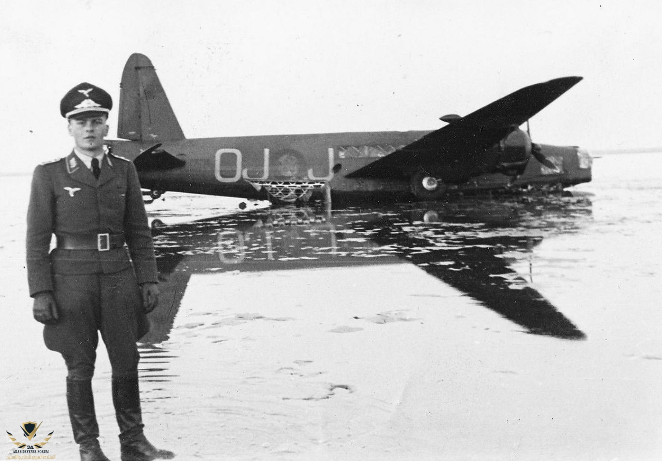 Luftwaffe Officer poses with Wellington Mark IA shot down over Denmark - April 1940.jpg