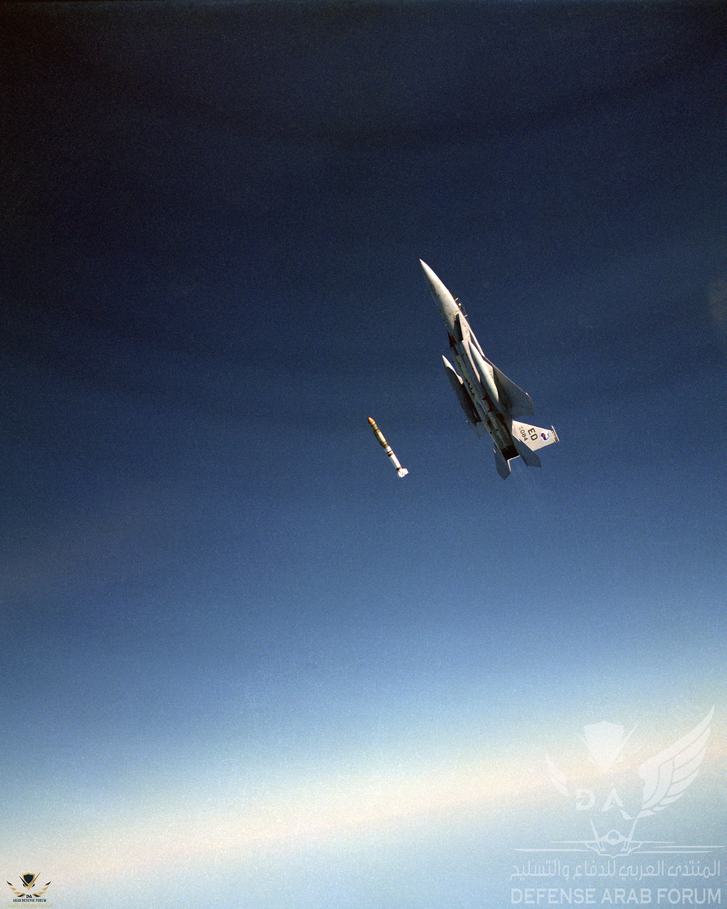An_air-to-air_left_side_view_of_an_F-15_Eagle_aircraft_releasing_an_anti-satellite_(ASAT)_mis...jpeg