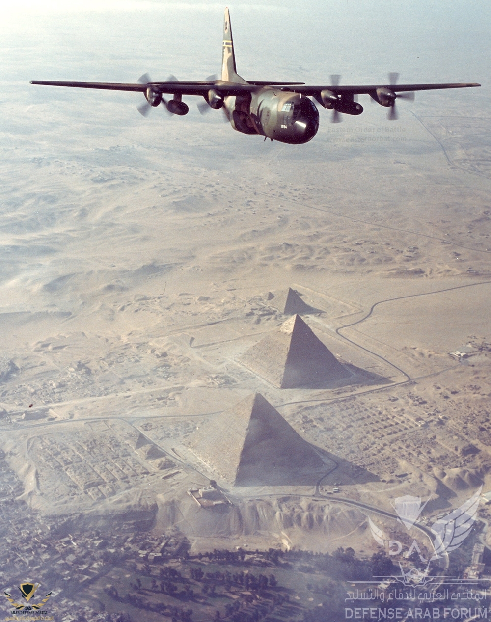 C-130E_of_the_130th_Airlift_Group_out_of_Charleston__West_Virginia_flying_over_the_famed_pyram...JPG