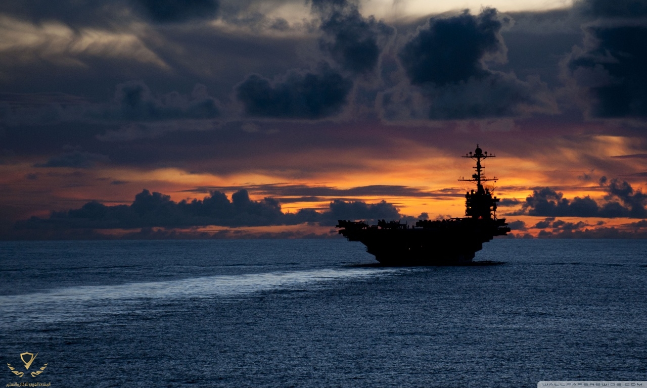 aircraft_carrier_at_sunset-wallpaper-1280x768.jpg