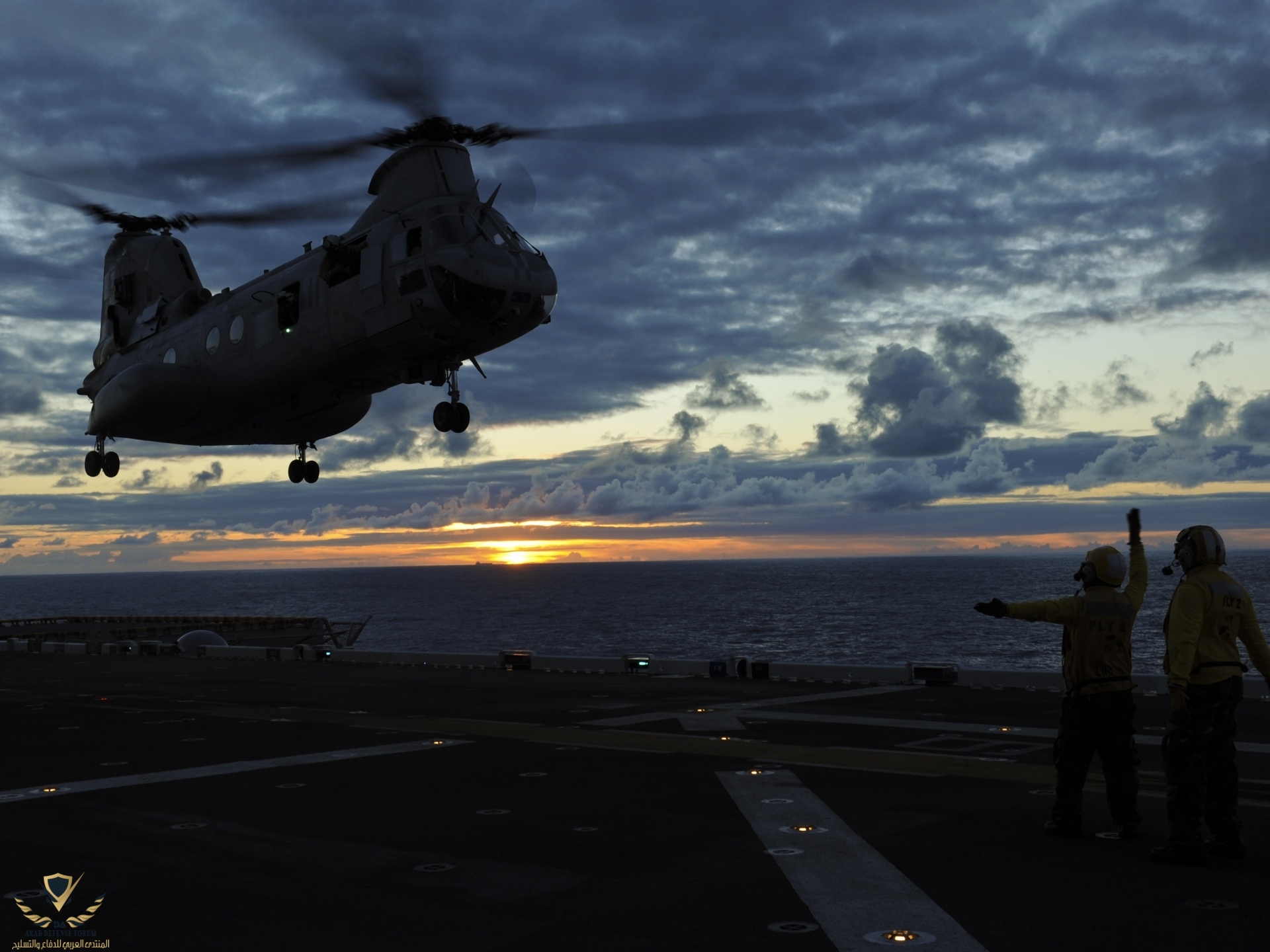 a_sailor_signals_a_helicopter-wallpaper-1920x1440_Wondershare.jpg