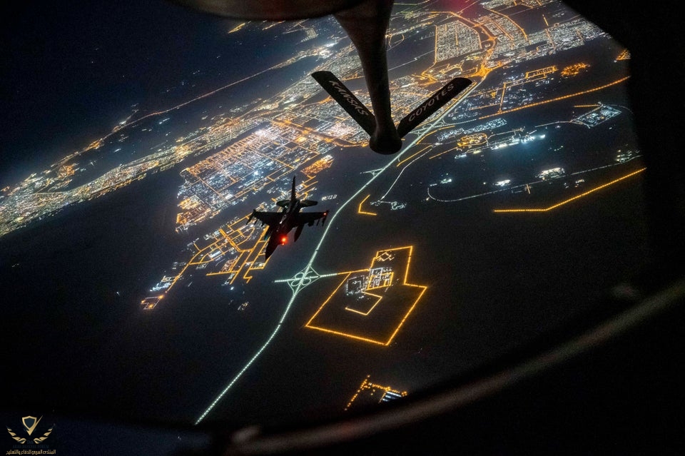 F16 Fighting Falcon receives fuel from a KC135 Stratotanker over the US Central Command area o...jpg