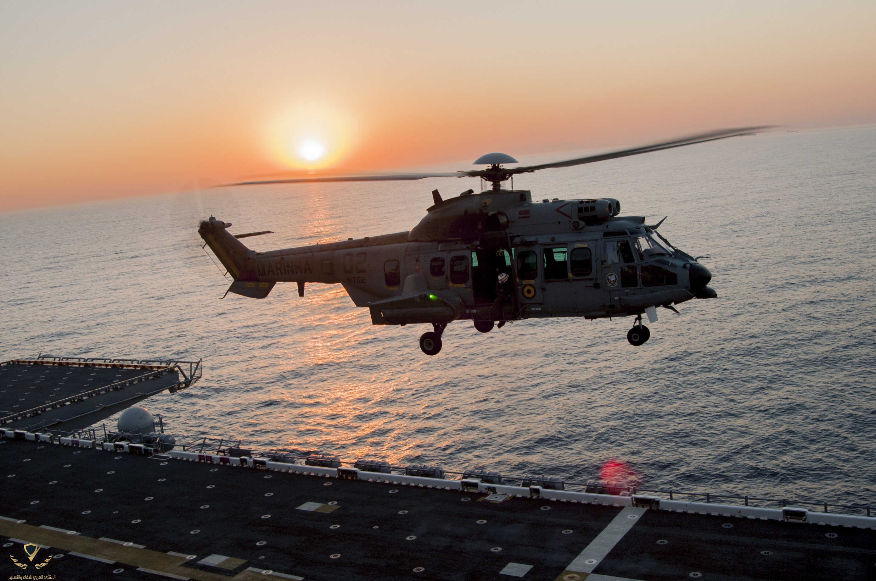 A Brazilian EC725 preparing to land on the flight deck of amphibious assault ship USS America,...jpg