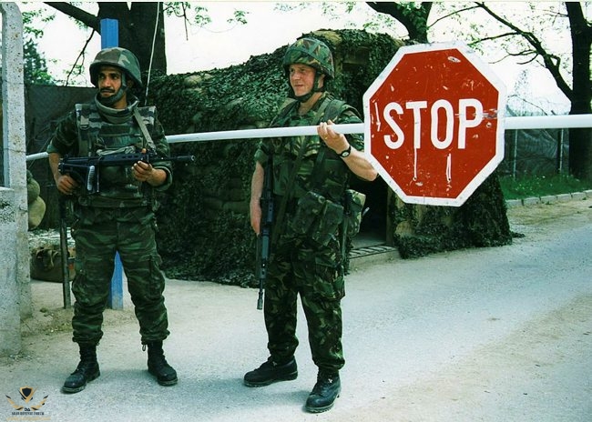 British soldier on duty at the main gate of HQ ARRC, Sarajevo, with a soldier of the Moroccan ...jpg
