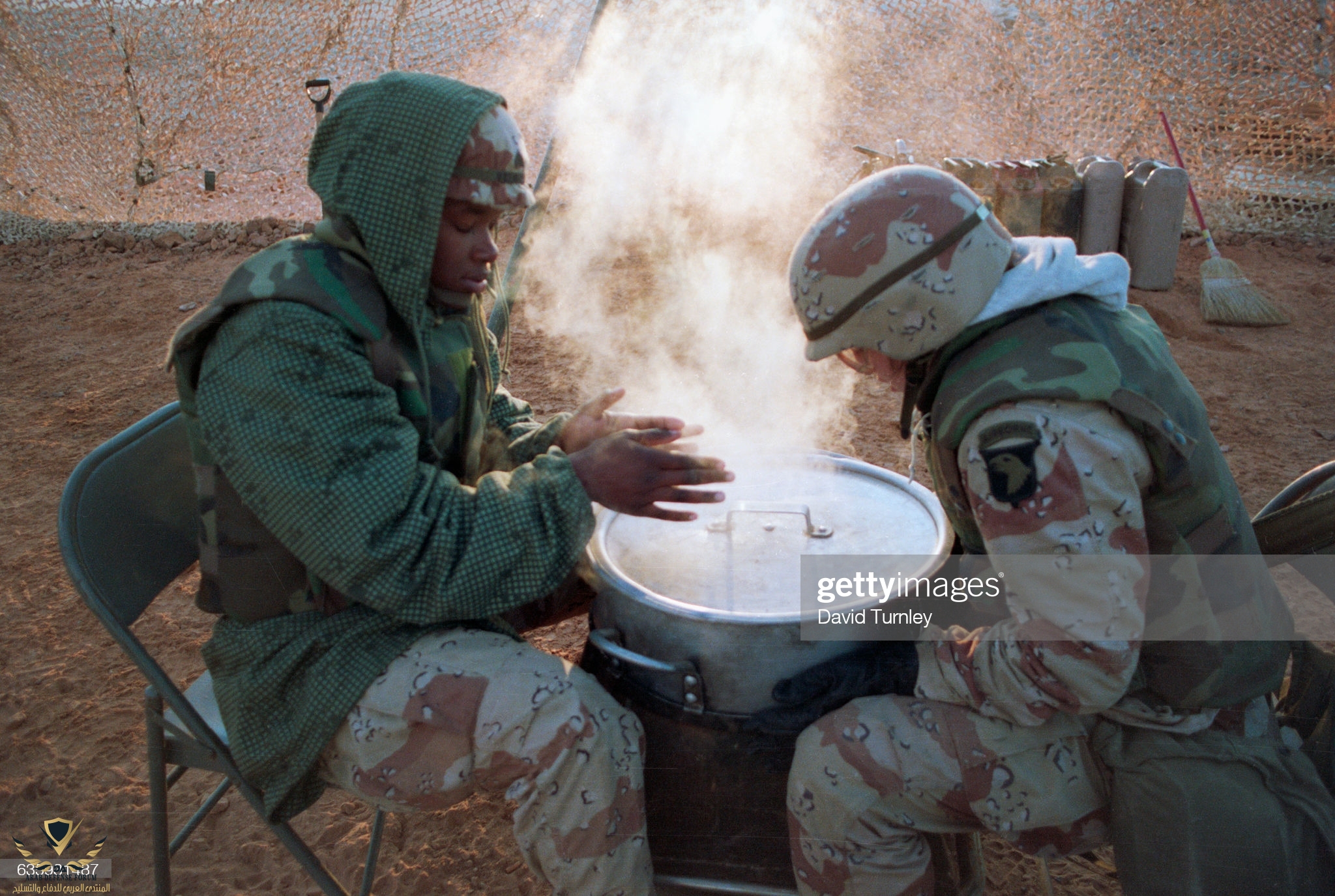 American Soldiers Keeping Warm by Steam.jpg