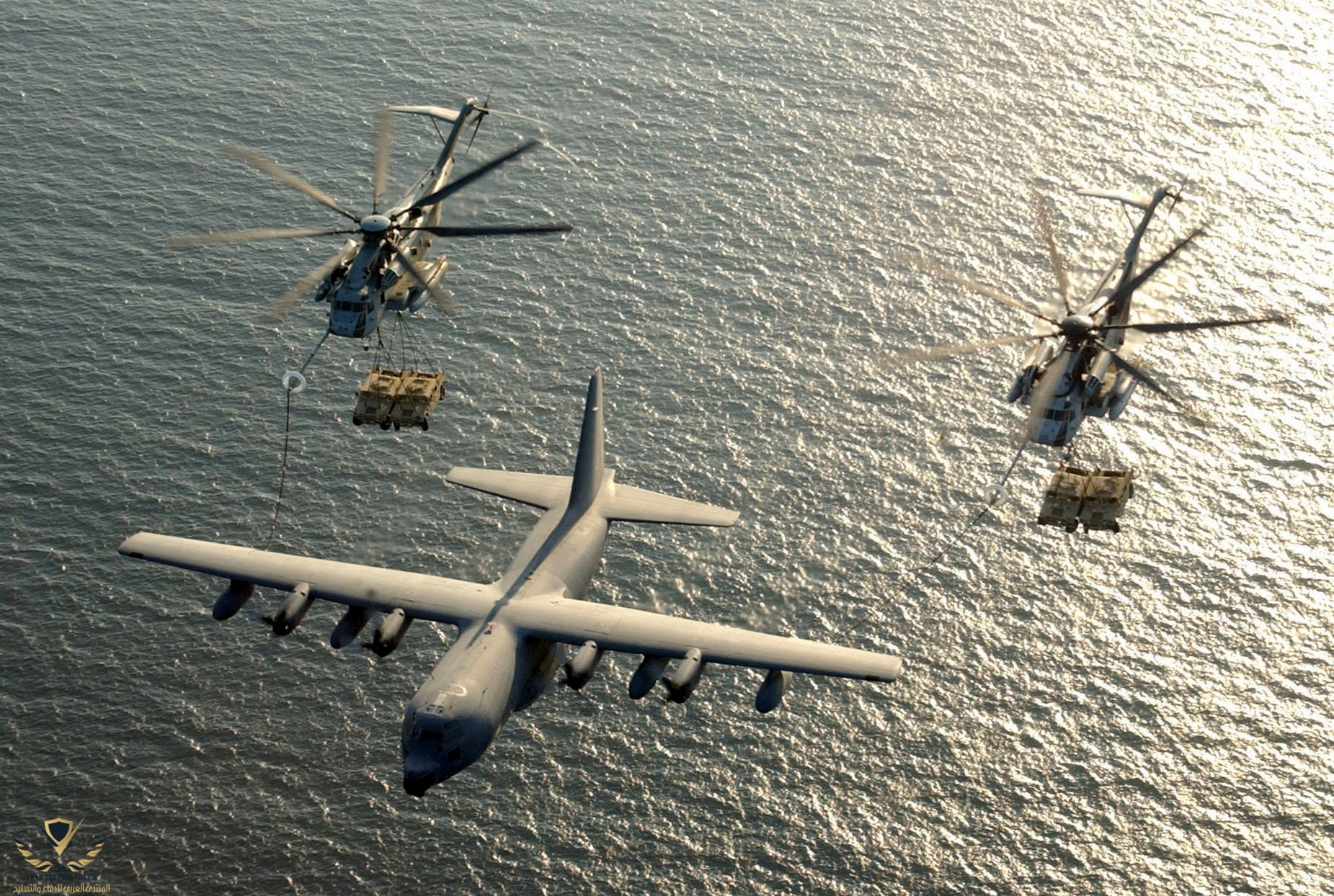 US_Navy_030130-M-0000X-001_Two_U.S._Marine_Corps_CH-53E_Super_Stallion_helicopters_assigned_to...jpg