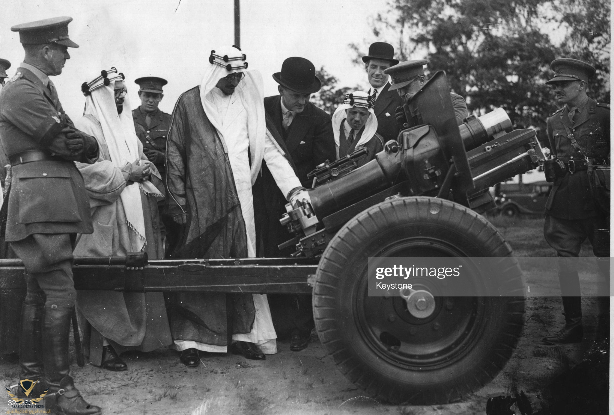 27th June 1935 Crown Prince Saud bin Abdul Aziz of Saudi Arabia inspects new artillery at Alde...jpg