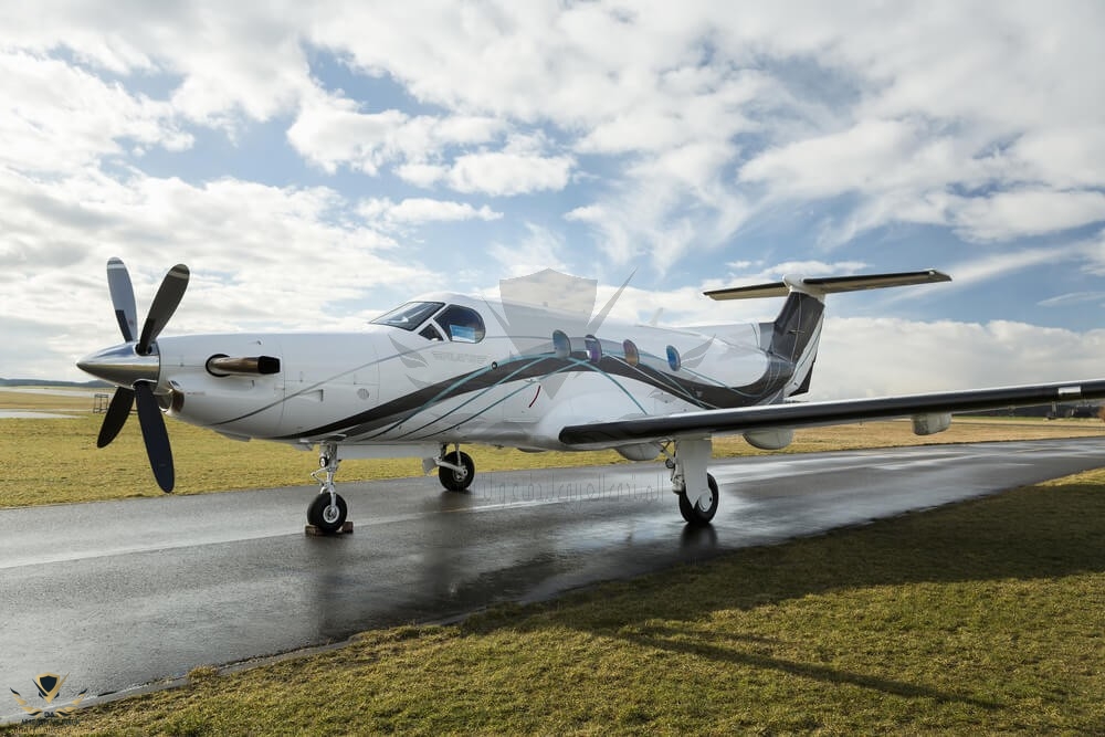 pilatus pc-12 on the ground in an airport.jpg