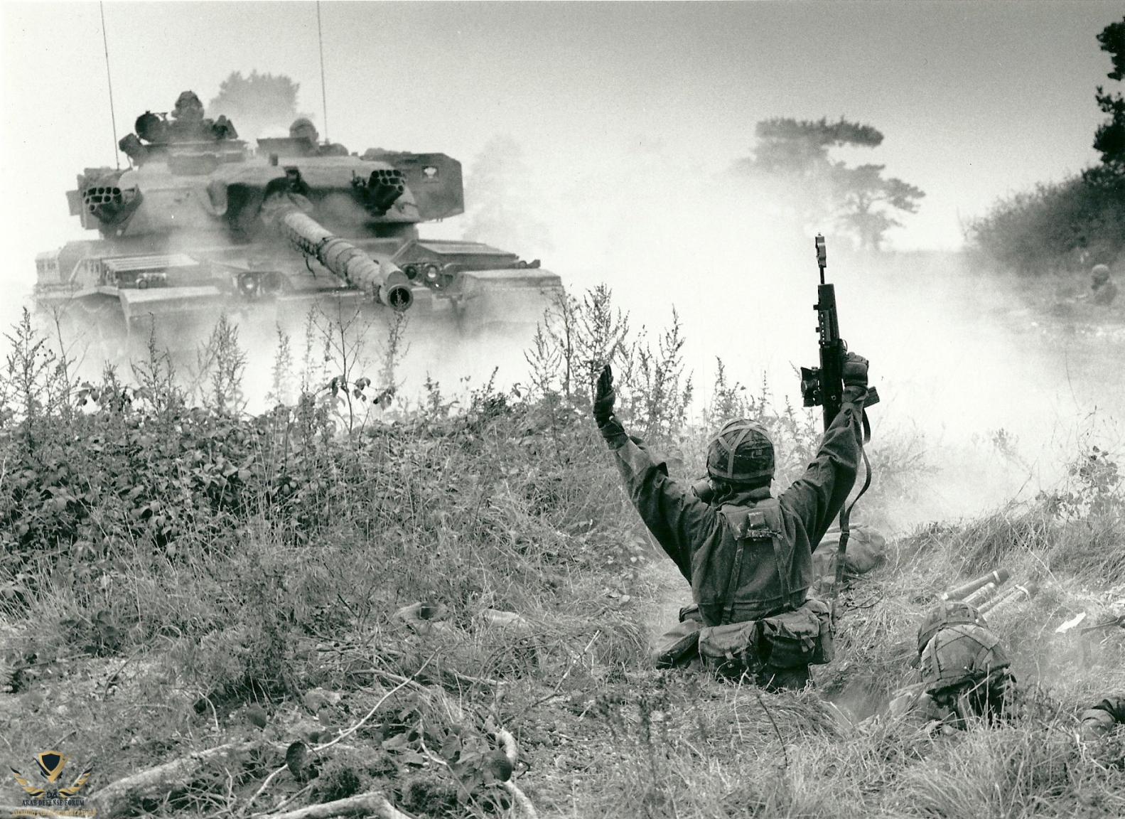 Bringing a rifle to a tank battle_ British soldier surrendering to a British Chieftain tank [...jpeg