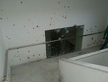 220px-Shooting_impacts_in_Bardo_museum.jpg