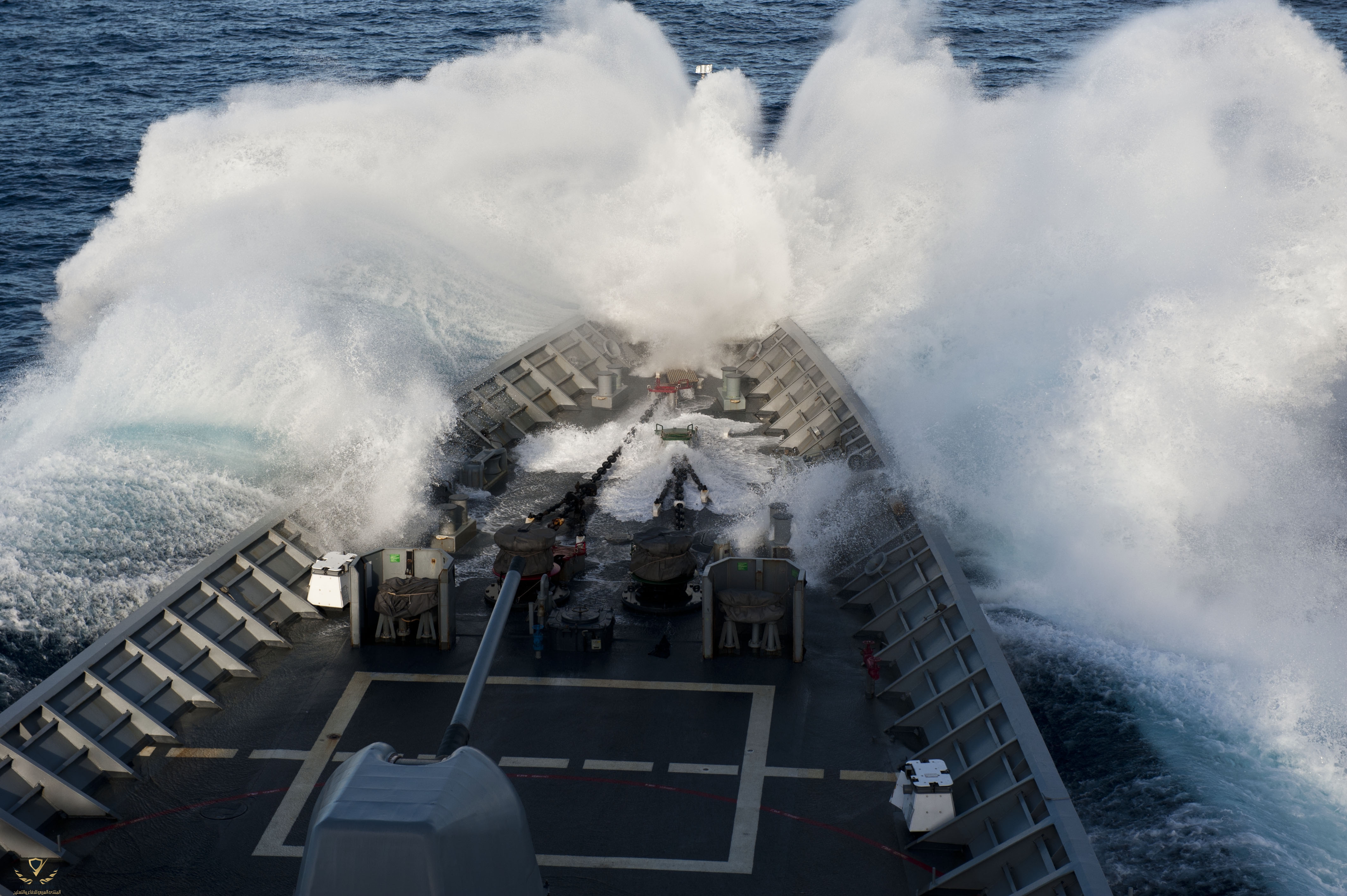 Flickr_-_Official_U.S._Navy_Imagery_-_USS_Cowpens_moves_through_heavy_seas.-1.jpg
