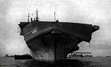 220px-Flight_deck_of_USS_Bennington_(CV-20)_damaged_by_typhoon,_12_June_1945.jpg