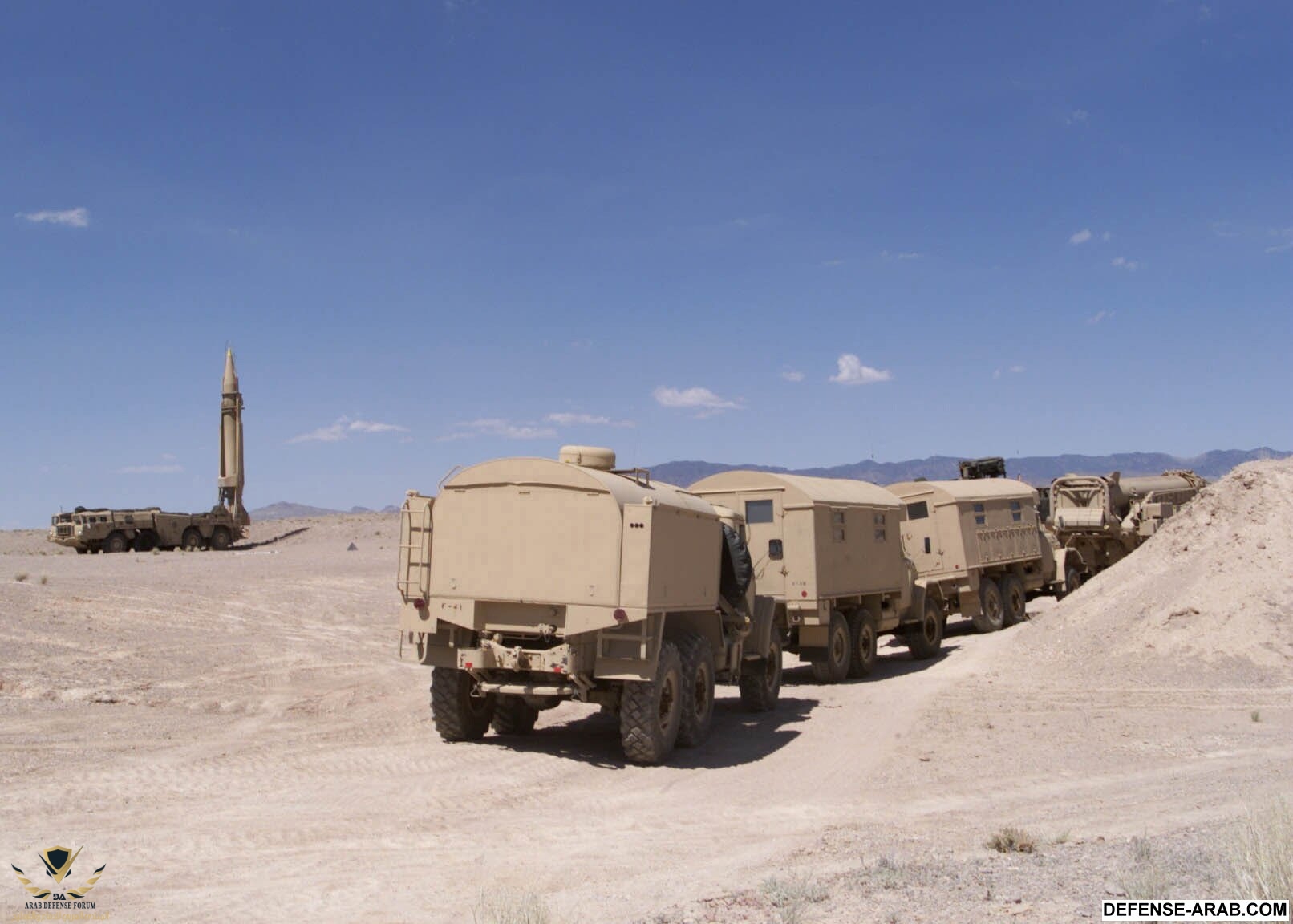 SCUD_missle_launcher_with_support_vehicles_(2000).JPEG