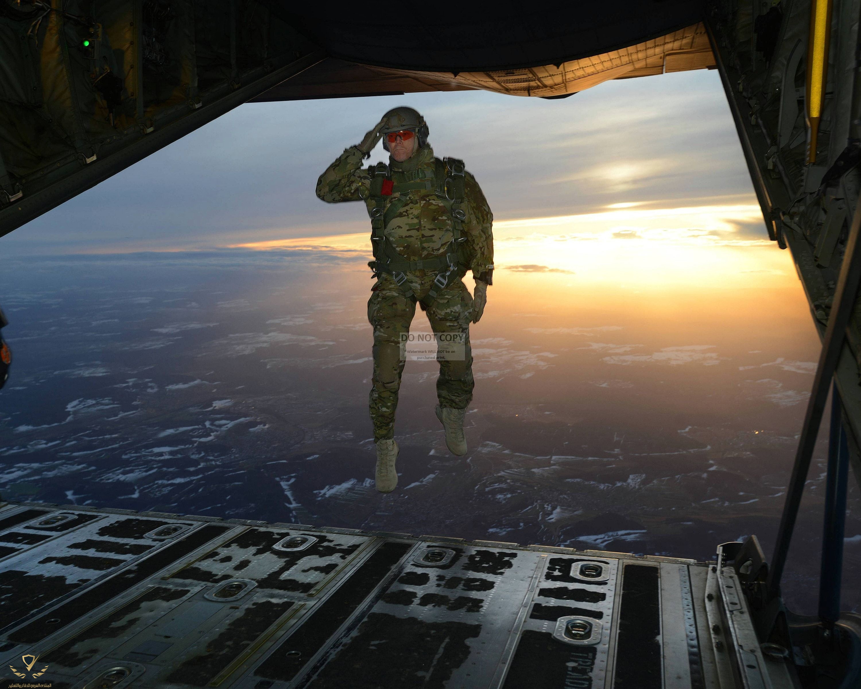 Soldier Salutes Troops as He Jumps Out of a C-130 Hercules Aircraft - 8X10 or 11X14 Photo (EP...jpeg