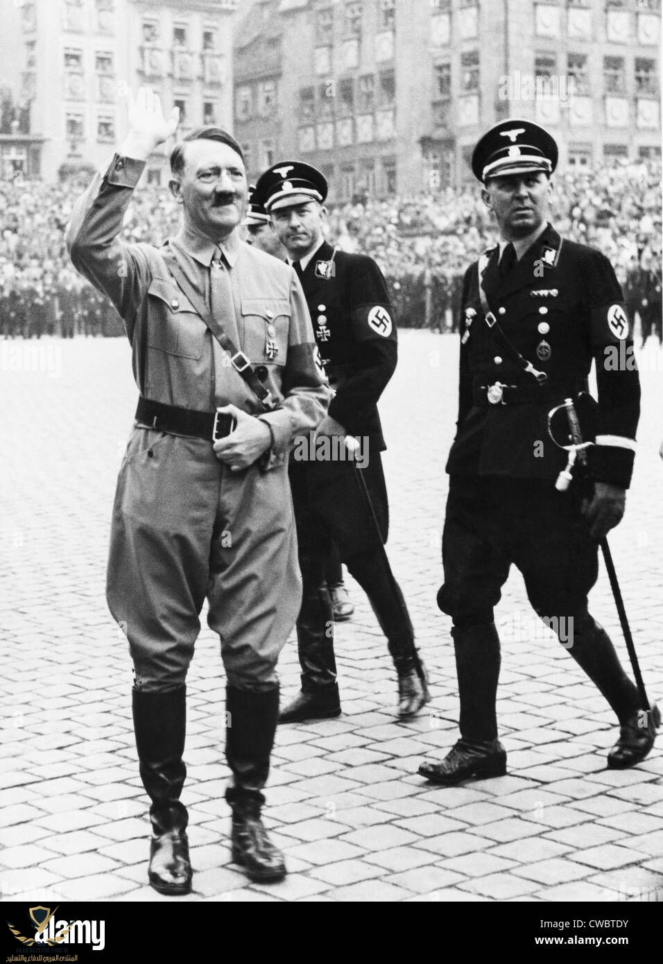 adolf-hitler-saluting-with-two-ss-generals-in-uniform-behind-him-at-CWBTDY.jpg