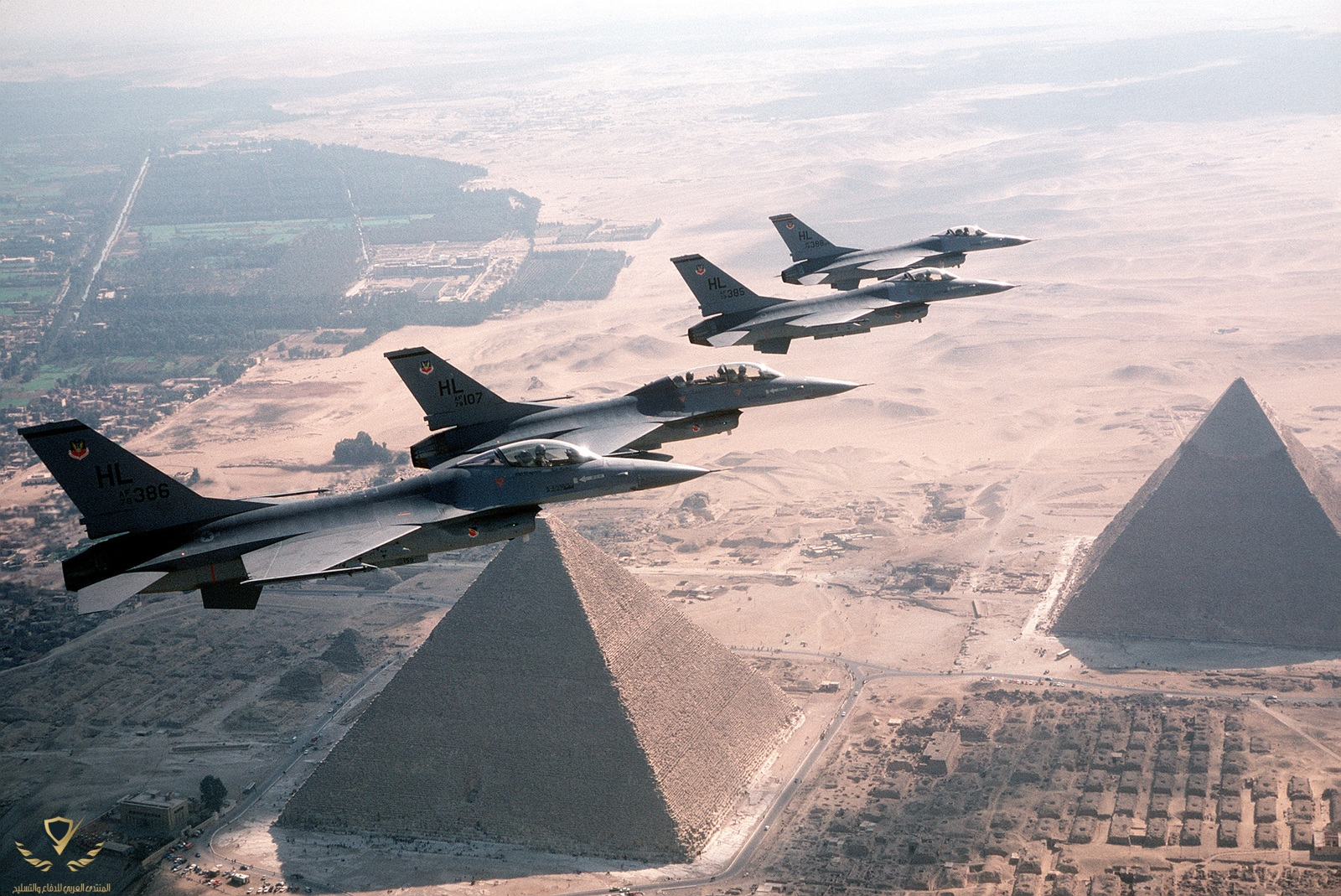 a-right-side-view-of-a-formation-of-four-f-16-fighting-falcon-aircraft-in-flight-430ce0-1600.jpg