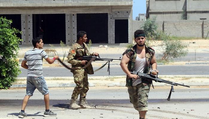 60-205533-insurgent-assault-policeman-tripoli_700x400.jpeg