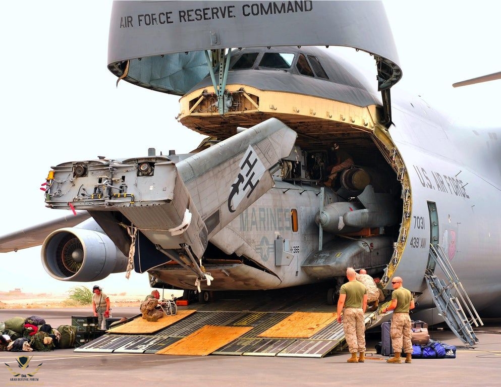 C-5 Galaxy Cargo unloading a CH-53E Super Stallion.jpeg