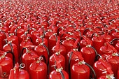 fire-extinguishers-a-lot-of-red-extinguishers-with-foam.jpg