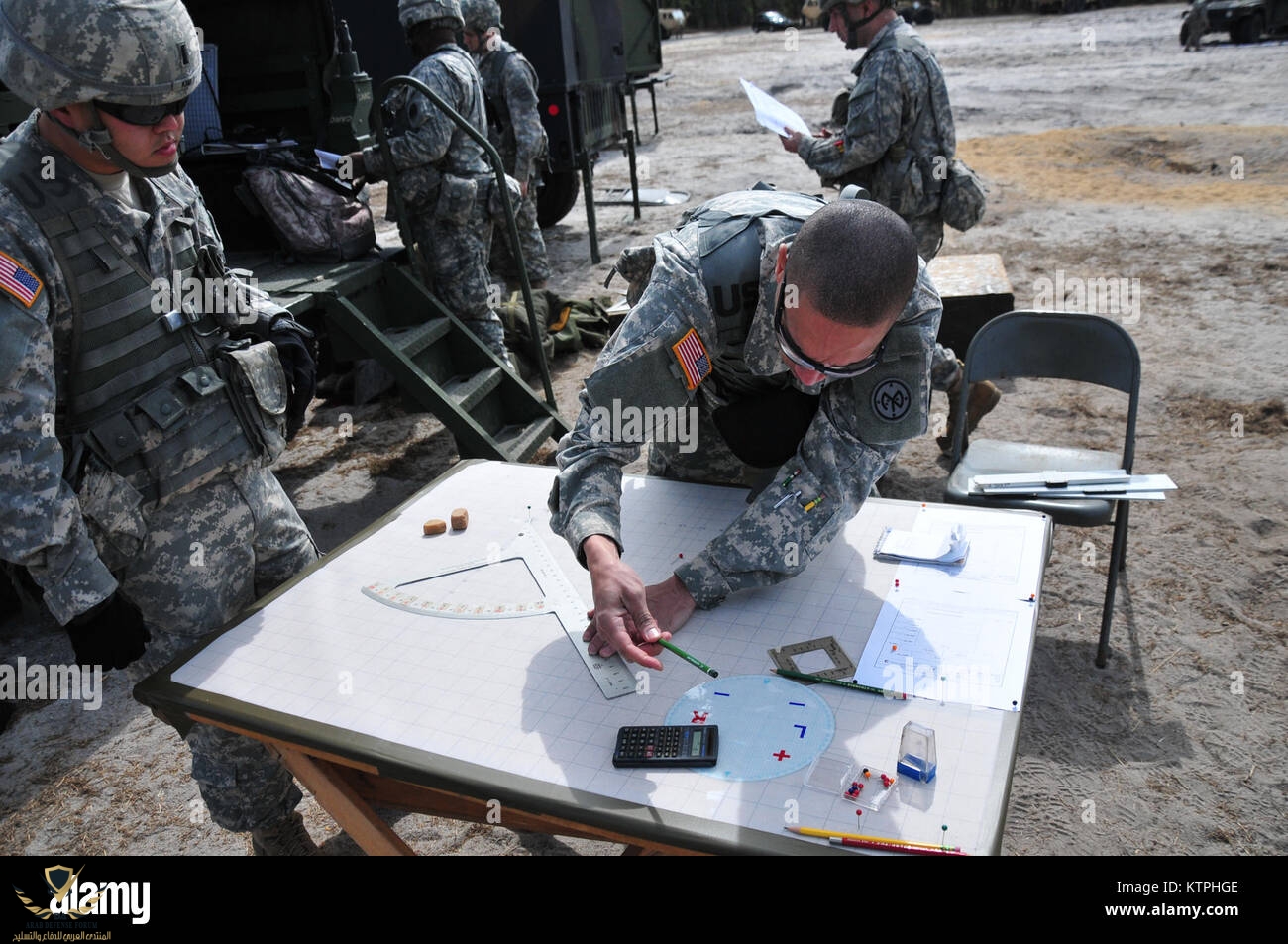 battery-b-258th-field-artillery-soldiers-work-at-the-fire-directioncontrol-KTPHGE.jpg