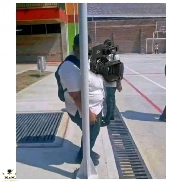 cameraman-with-a-big-camera-on-the-street-meme (1).jpg